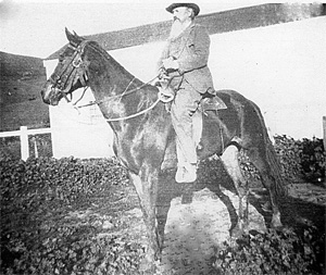 A photograph of Felix Grundy Coats on horseback