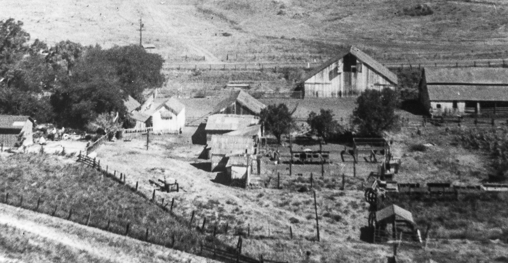 Ranch from the hill Photograph of the ranch building location.