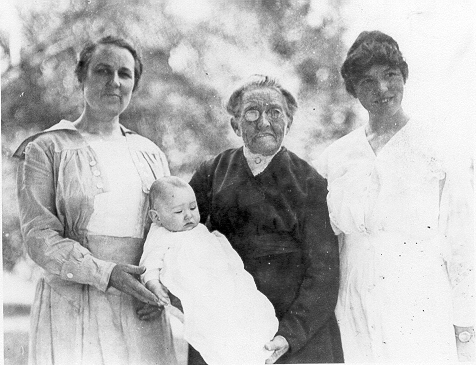 A photograph of four generations: Phyllis Ellen Rowe (1917 - 2006)
                       Eunice Evelyn Coats (1893 - 1979) Phoebe Ellen Bowles (1873 - 1962) Ellen Patton (1841 - 1927)